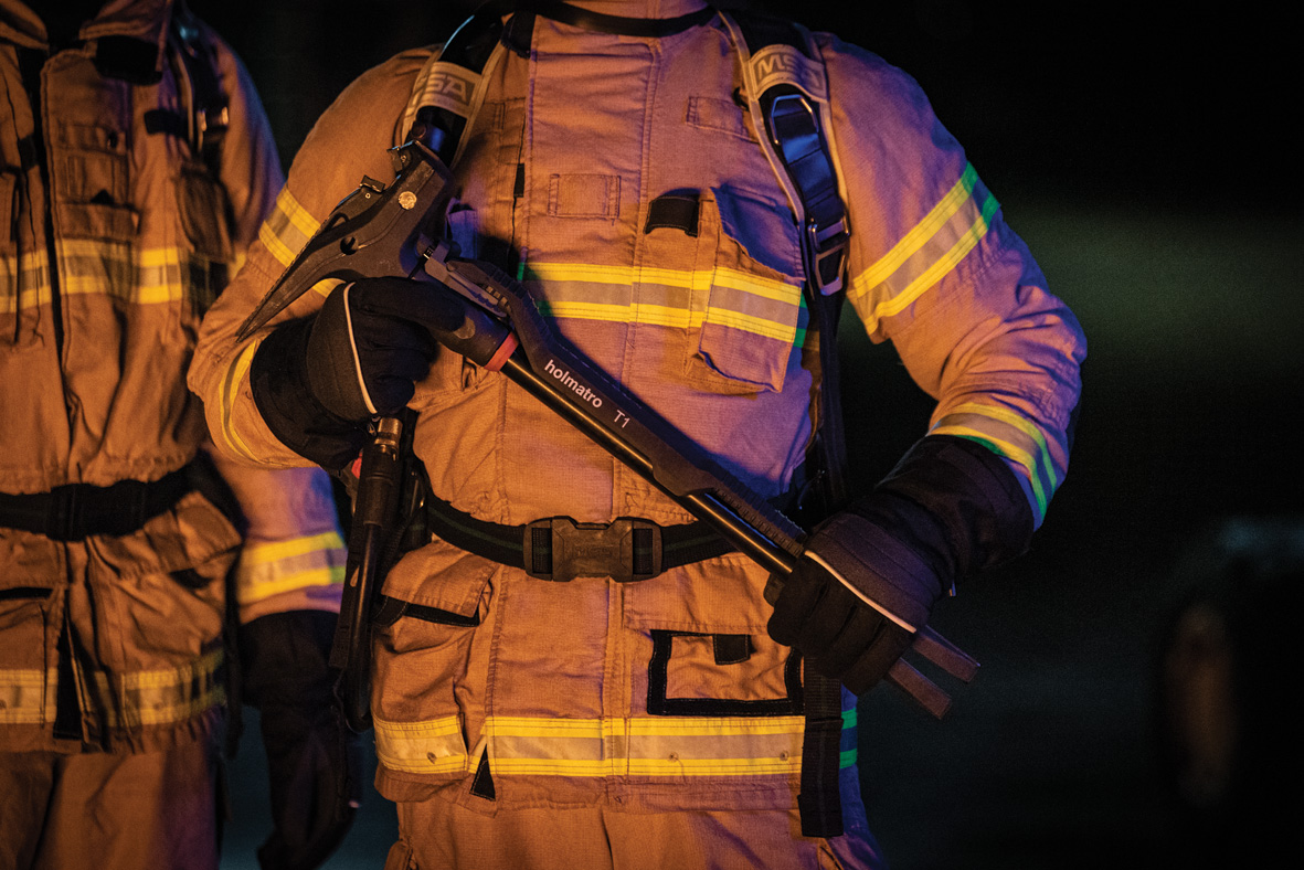 A fireman holding the T1 Forcible Entry Tool